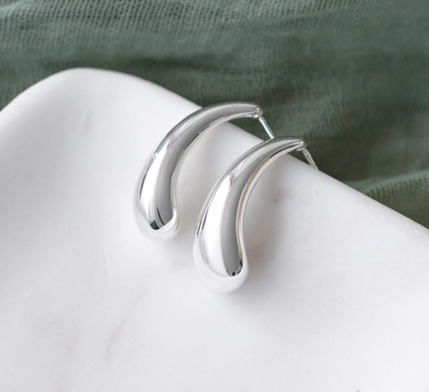 Power curve earrings